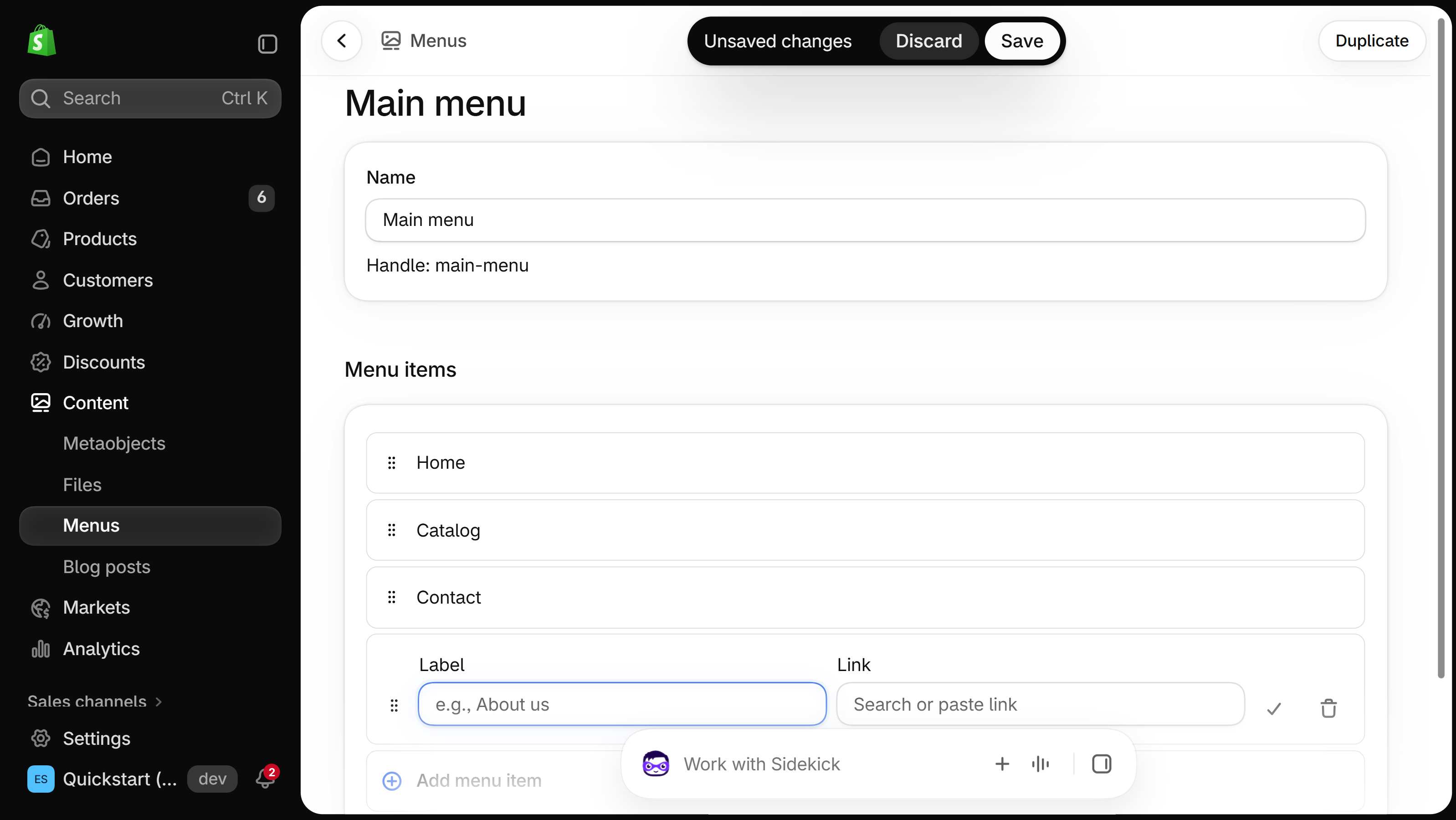 Main menu editor with Home, Catalog and Contact items and a new unsaved row with an empty Label field and a Link field reading Search or paste link.