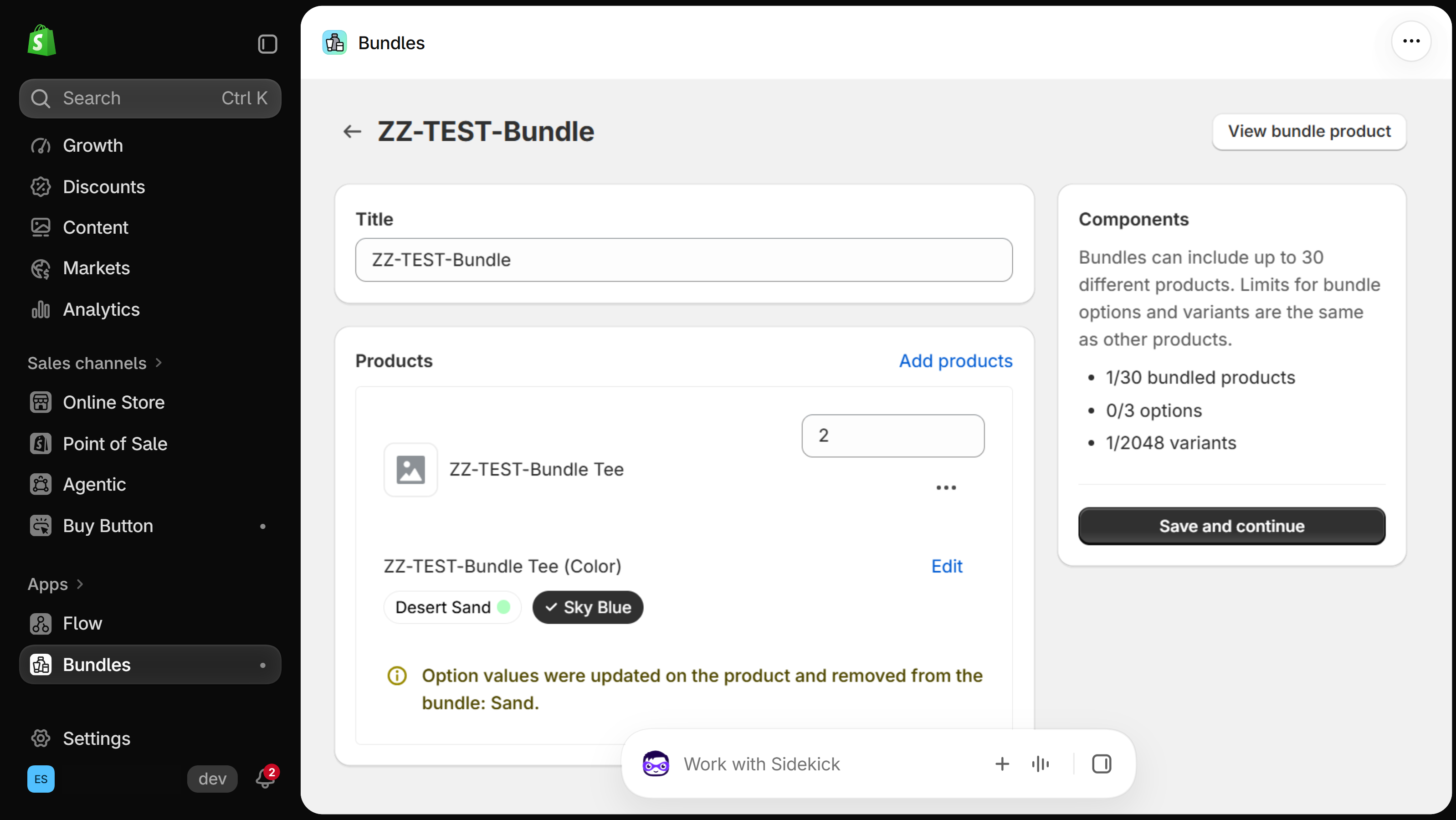 Shopify Bundles app page for a test bundle: the Products card lists one component with quantity 2 and its Color values, Sky Blue selected and the renamed Desert Sand not selected, above a warning that reads Option values were updated on the product and removed from the bundle: Sand; the Components card on the right counts bundled products, options and variants above a Save and continue button