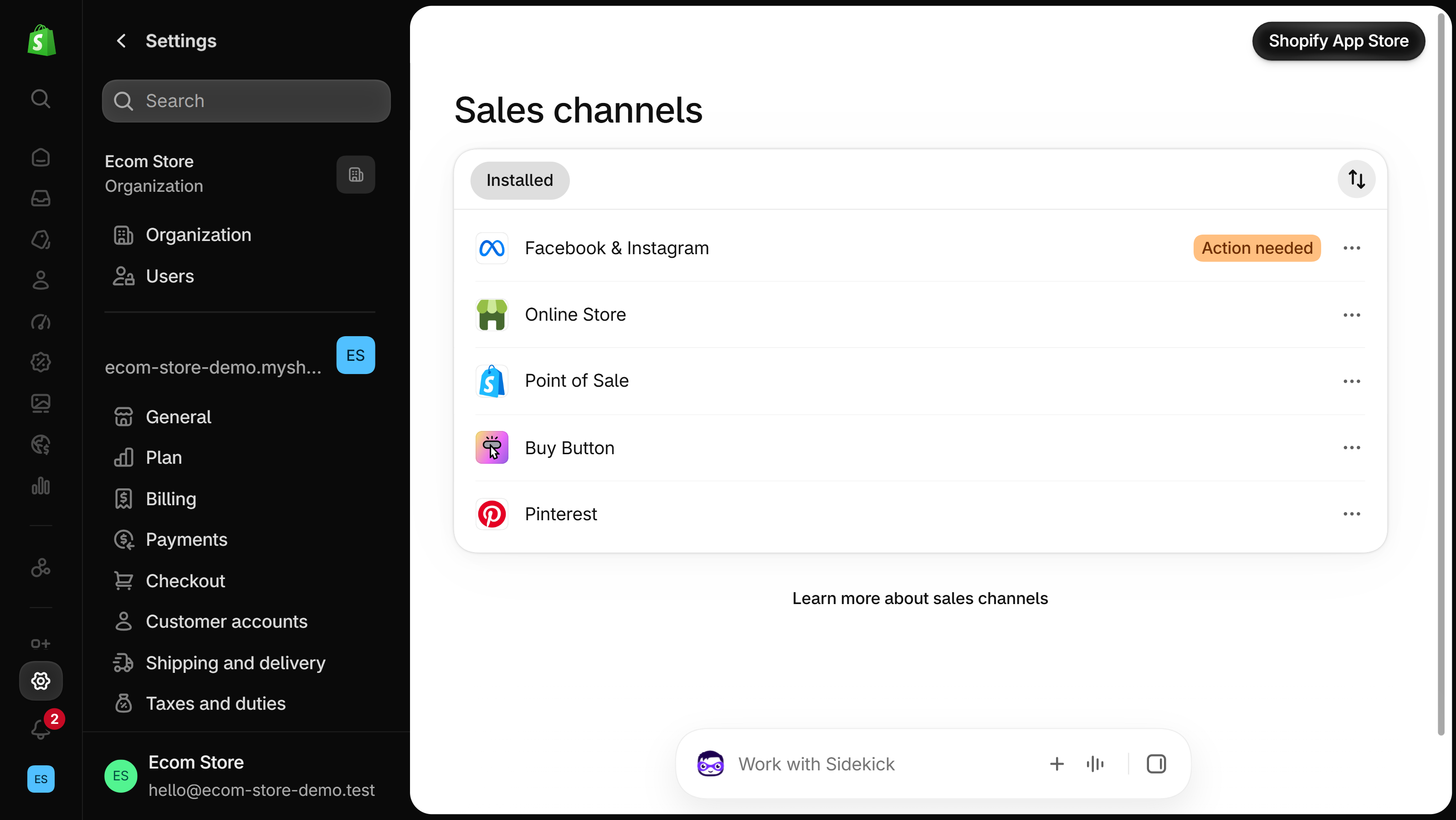 Shopify admin Settings, Sales channels page listing installed channels including Online Store, Point of Sale and Buy Button, with a Shopify App Store button at the top right