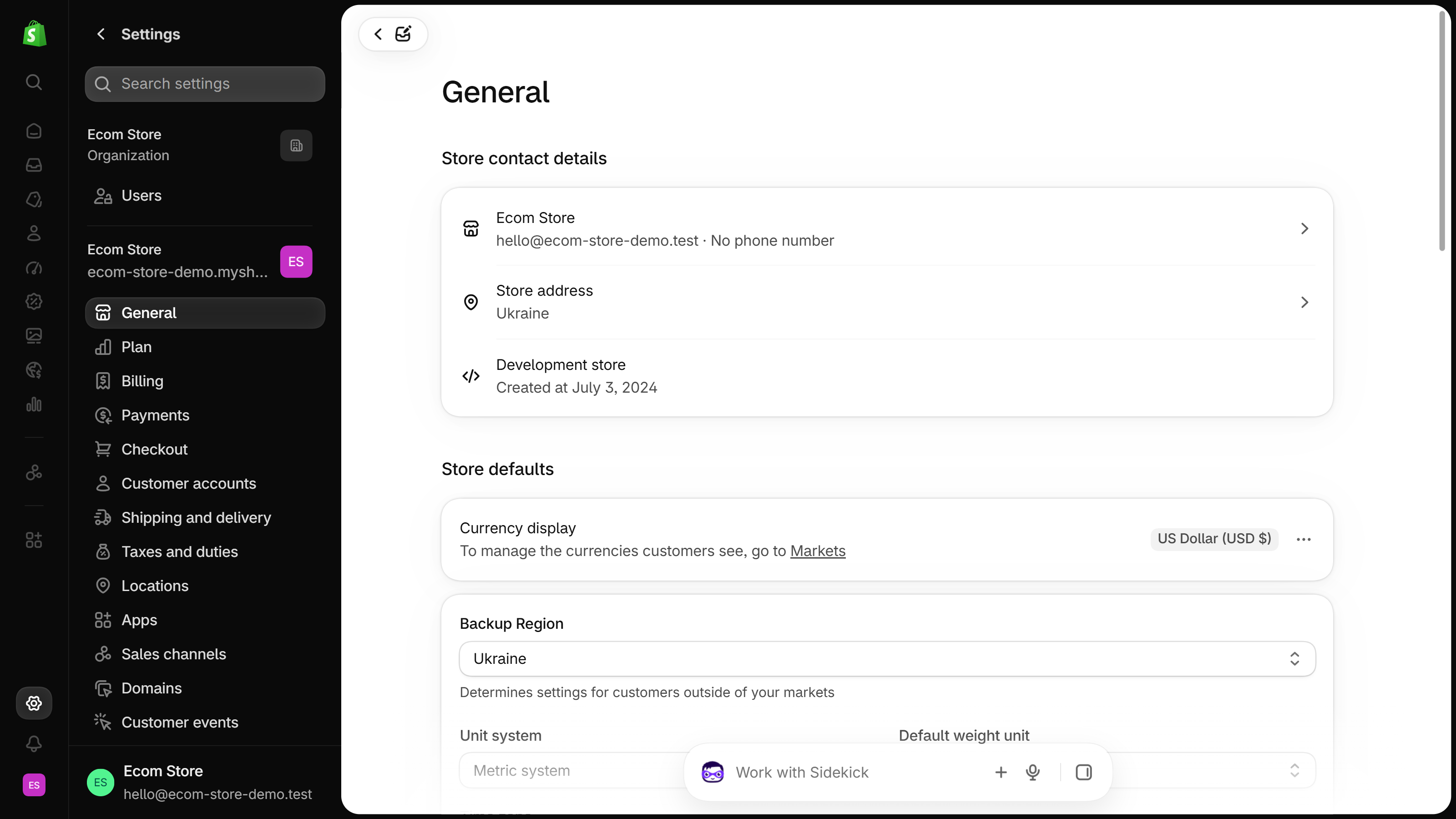 Shopify admin Settings General page showing Store contact details and the Store defaults section, with the Backup Region drop-down set to Ukraine below Currency display; General highlighted in the settings menu